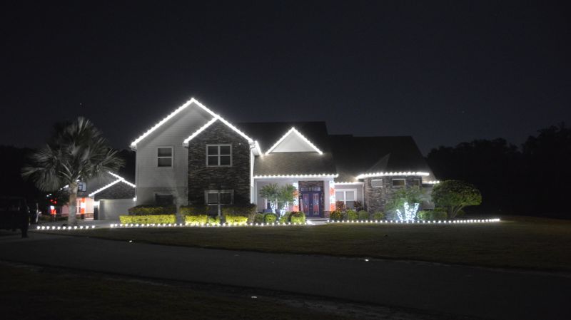 Christmas light installation on a home in Davenport, FL by Exterior Holiday Lights